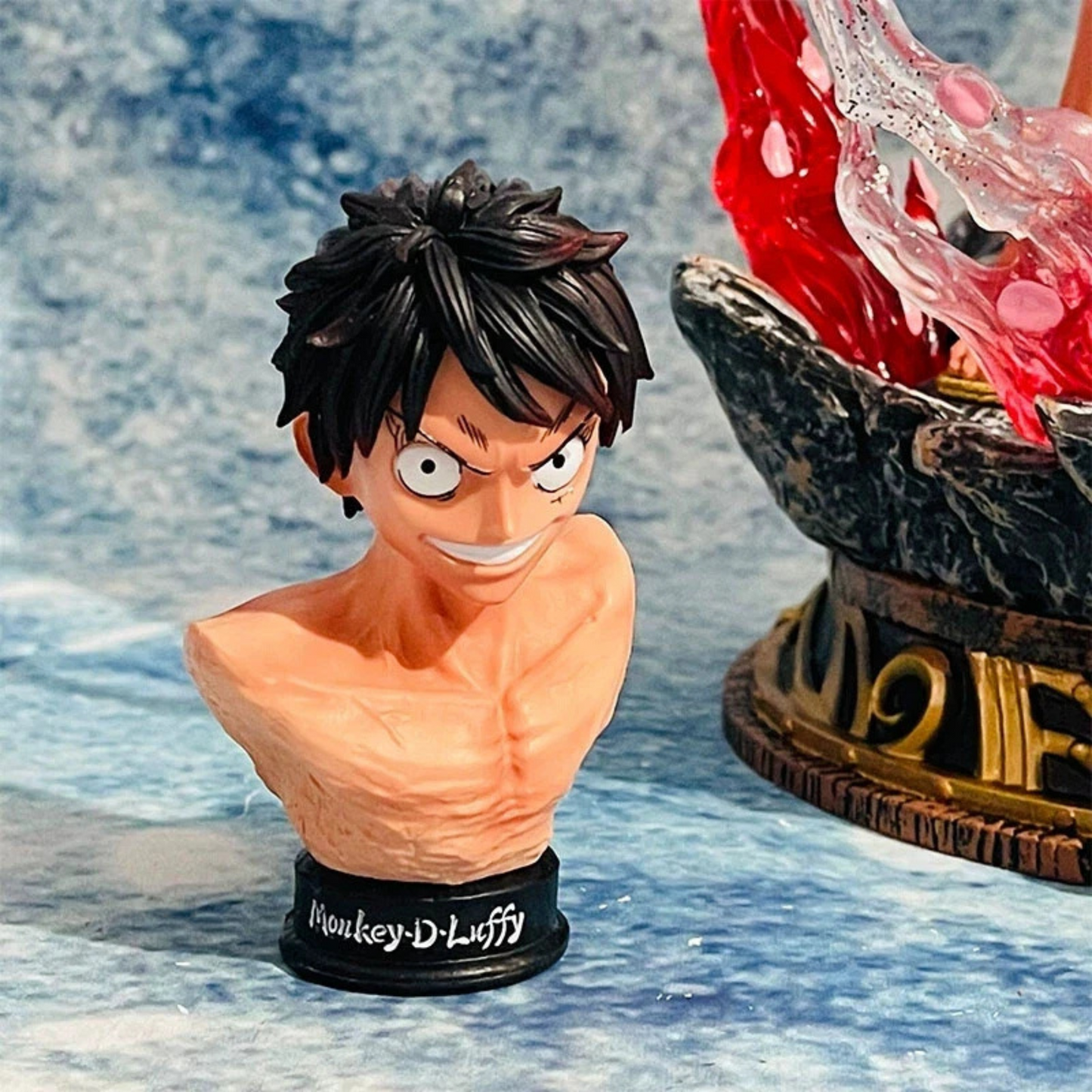 Monkey D. Luffy Conqueror's Haki figure with red aura, two heads, and detailed Straw Hat base from One Piece anime