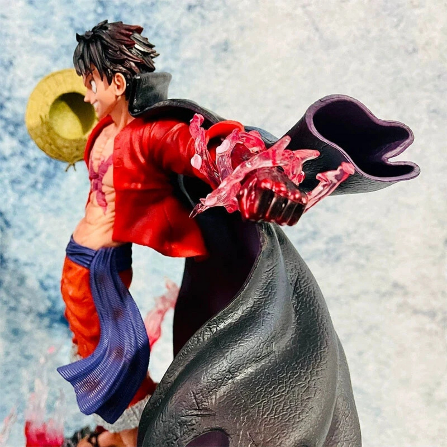 Monkey D. Luffy Conqueror's Haki figure with red aura, two heads, and detailed Straw Hat base from One Piece anime