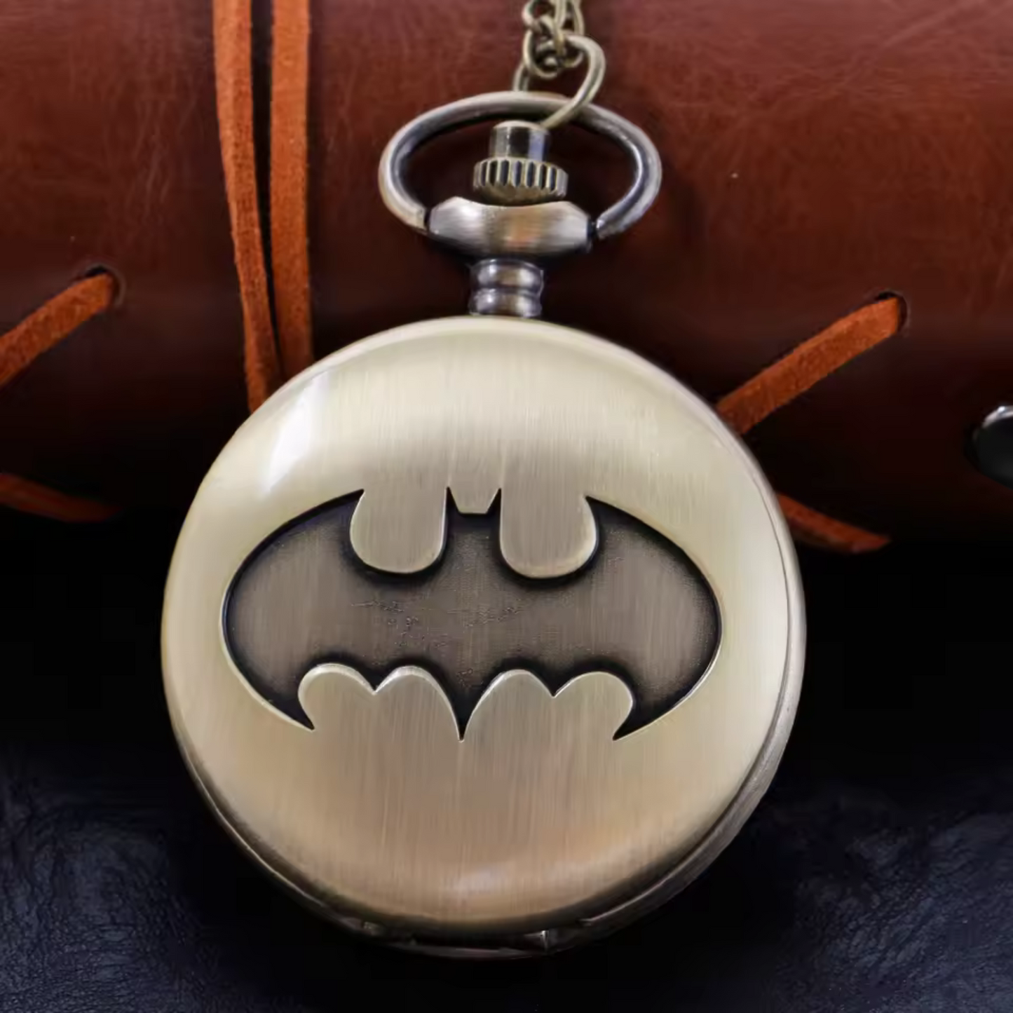 Vintage-style Batman metal pocket watch with keychain attachment featuring the iconic bat symbol