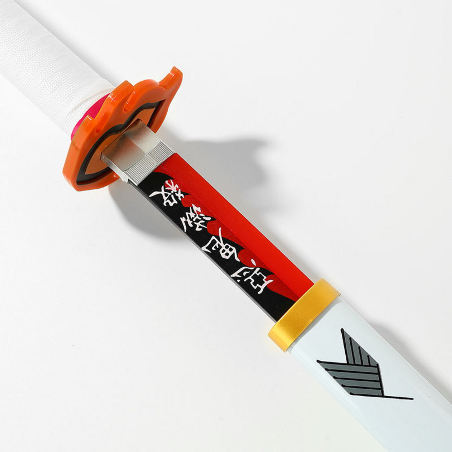 Close-up of Rengoku’s red blade with flame inscription and katana details