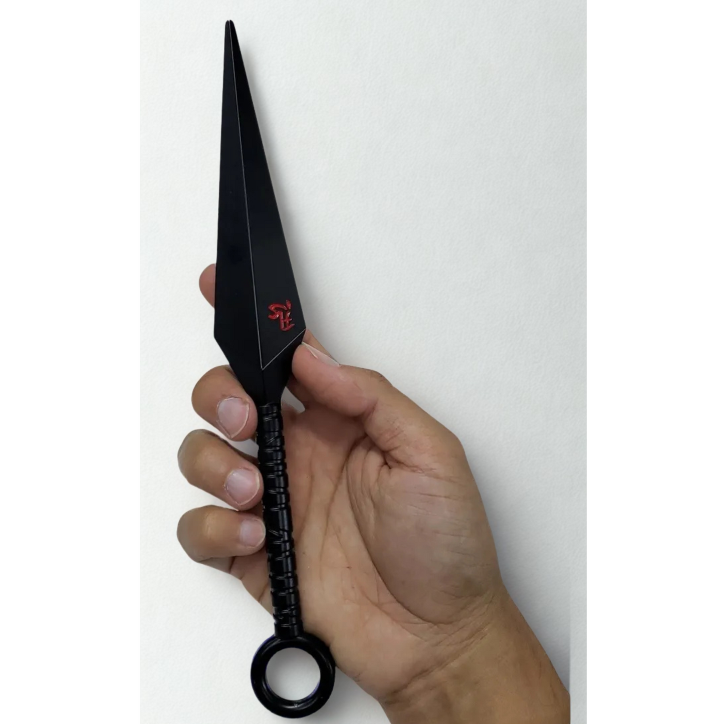 Naruto Asuma's Chakra Blade replica with black metallic finish and red kanji symbol, displayed vertically against a textured grey background