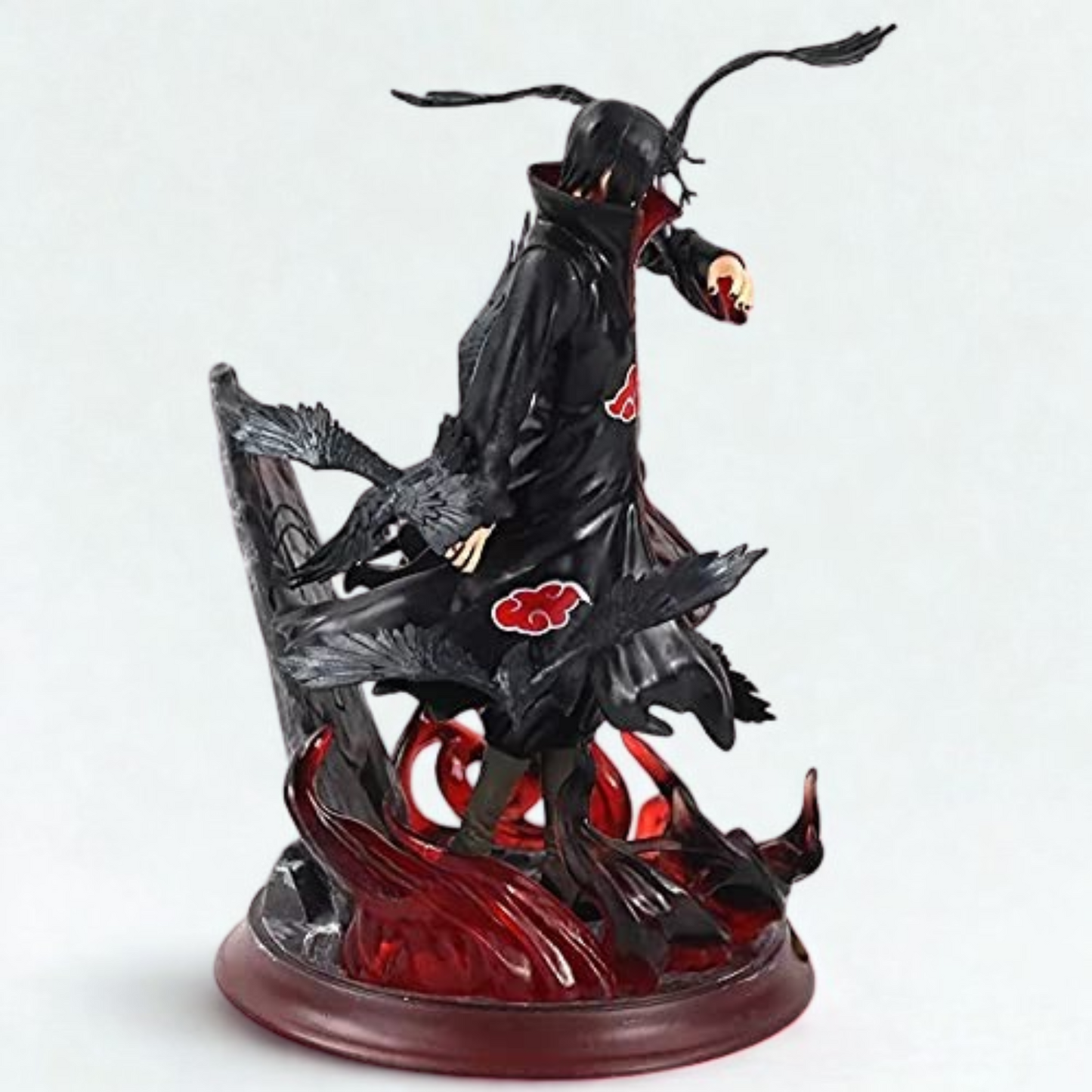 Close-up of Itachi’s intense expression and battle stance – 25 cm anime figure