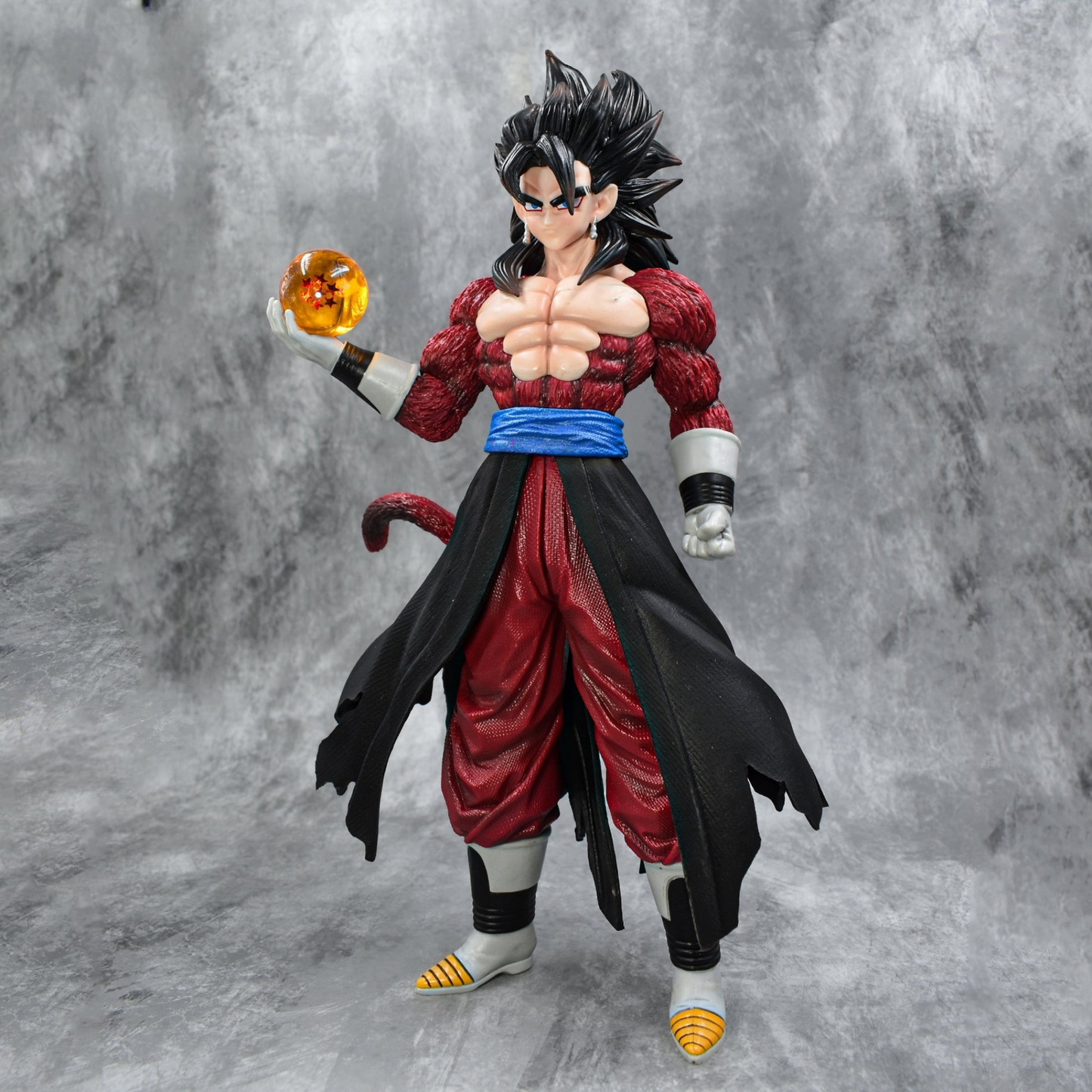 Super Saiyan 4 Goku collectible figure holding Dragon Ball