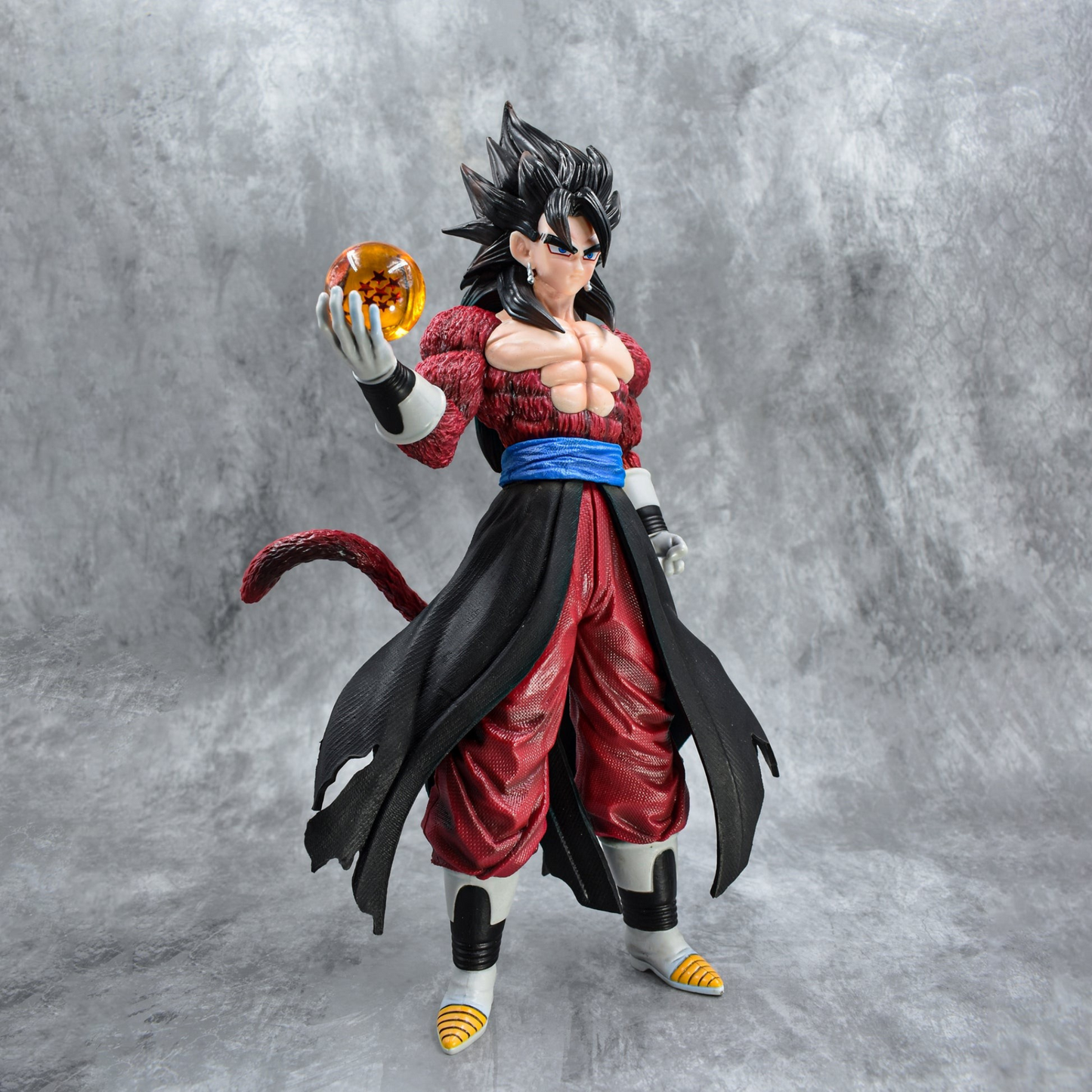 Super Saiyan 4 Goku collectible figure holding Dragon Ball