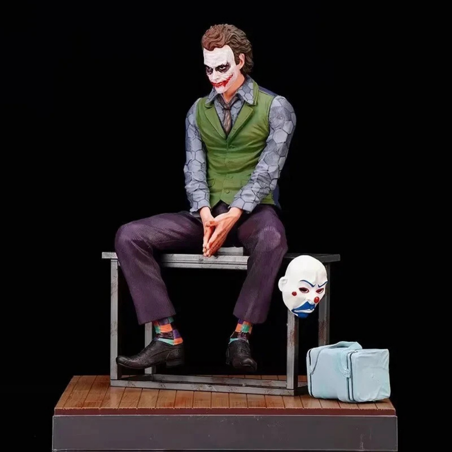 Close-up of Joker’s sinister grin and piercing gaze – detailed DC Comics figure