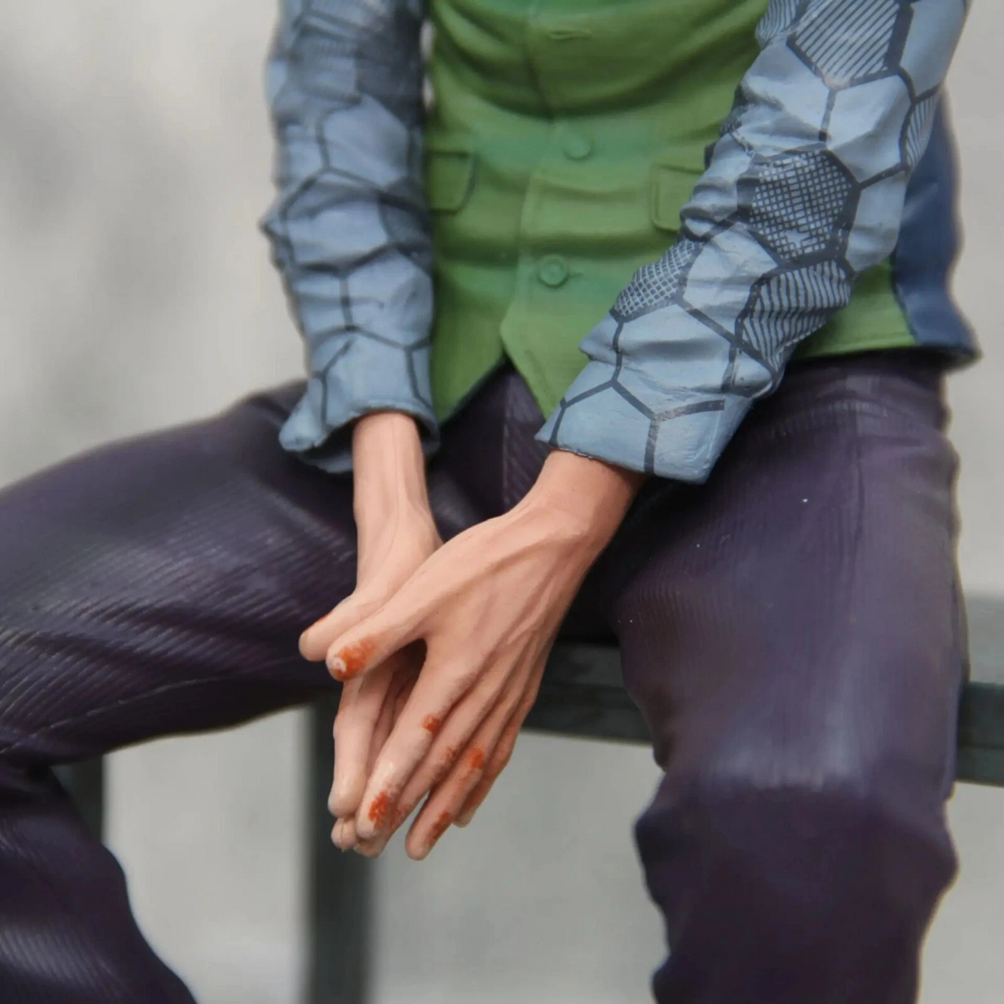 Close-up of Joker’s sinister grin and piercing gaze – detailed DC Comics figure
