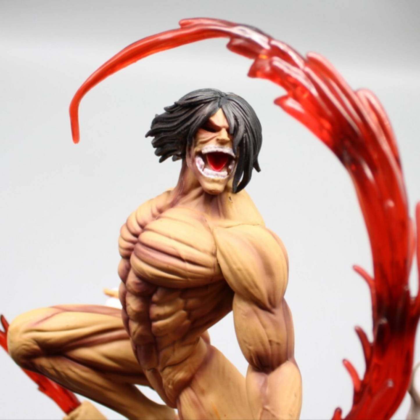 Eren Yeager Attack on Titan Action Figure in Fighting Pose – 29 cm anime collectible with Beast Titan defeat base.