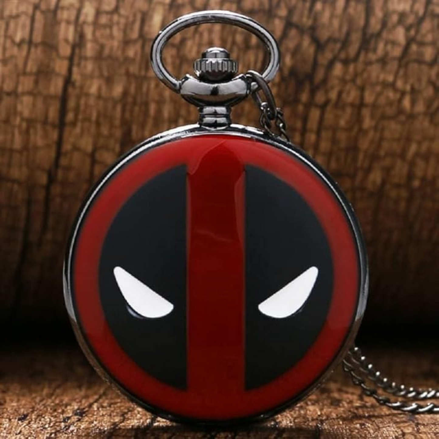 Close-up of Deadpool-themed pocket watch with retro dial and bold numerals