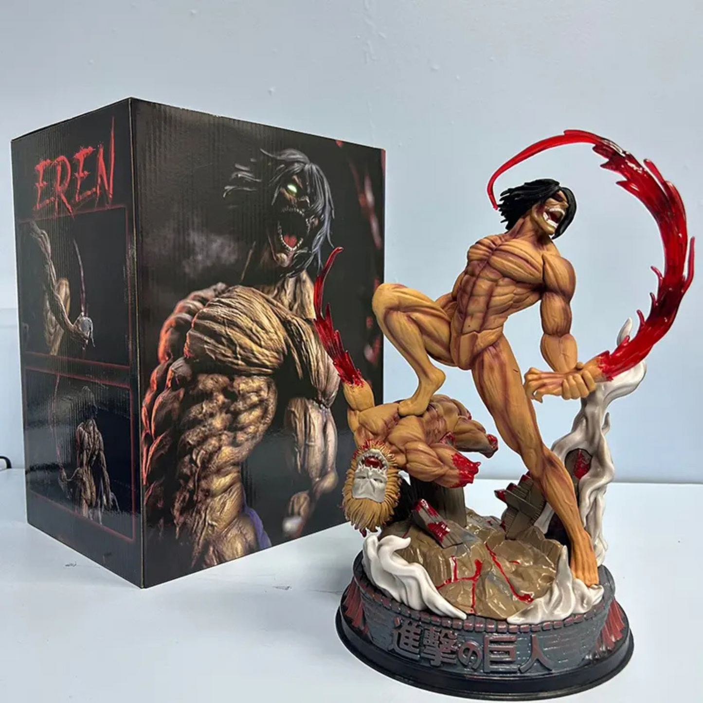 Eren Yeager Attack on Titan Action Figure in Fighting Pose – 29 cm anime collectible with Beast Titan defeat base.