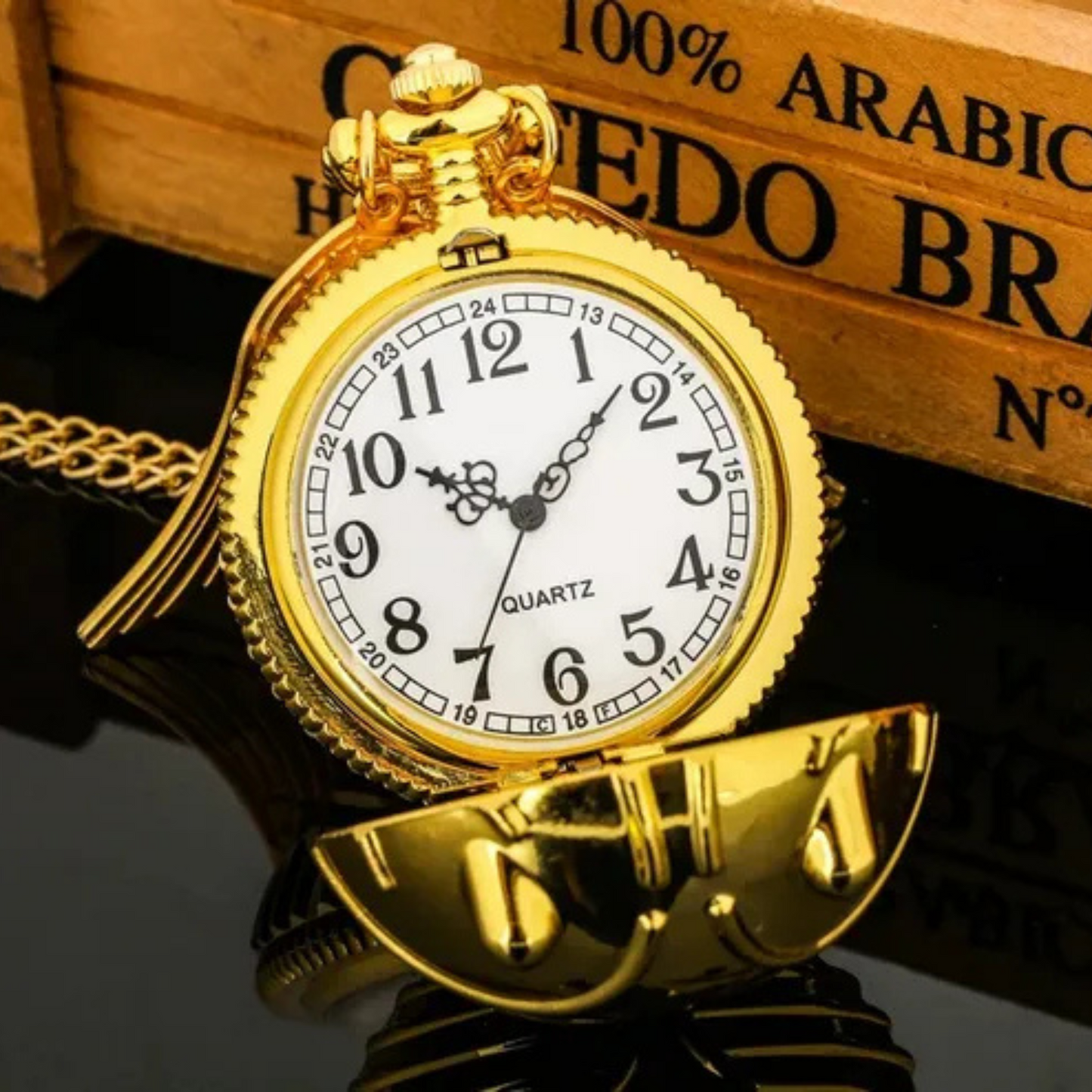 Golden Snitch pocket watch necklace with wings – Harry Potter themed collectible on golden mirror