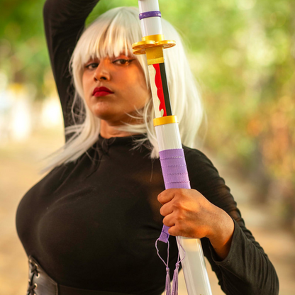 Zoro’s white Enma wooden katana displayed with white and gold hilt