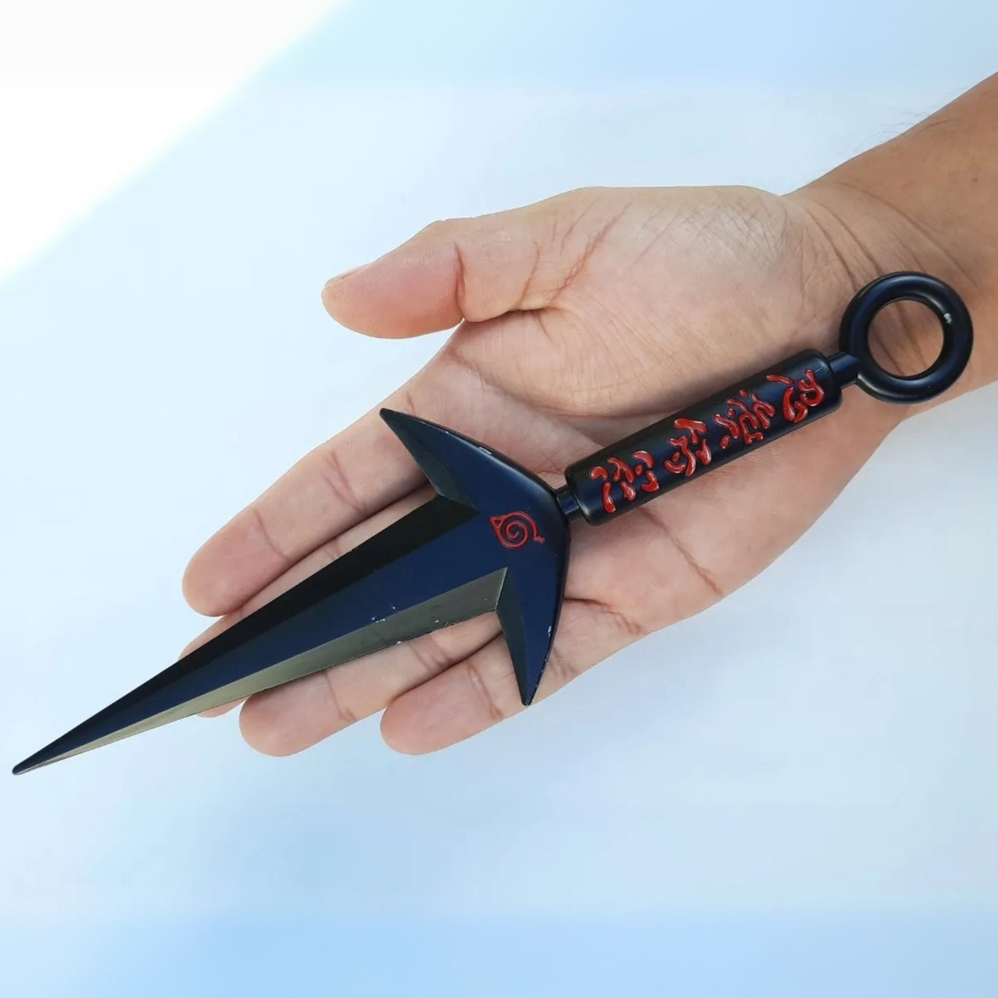 Naruto Minato Namikaze triple-blade black kunai replica with red kanji engraving on matte background