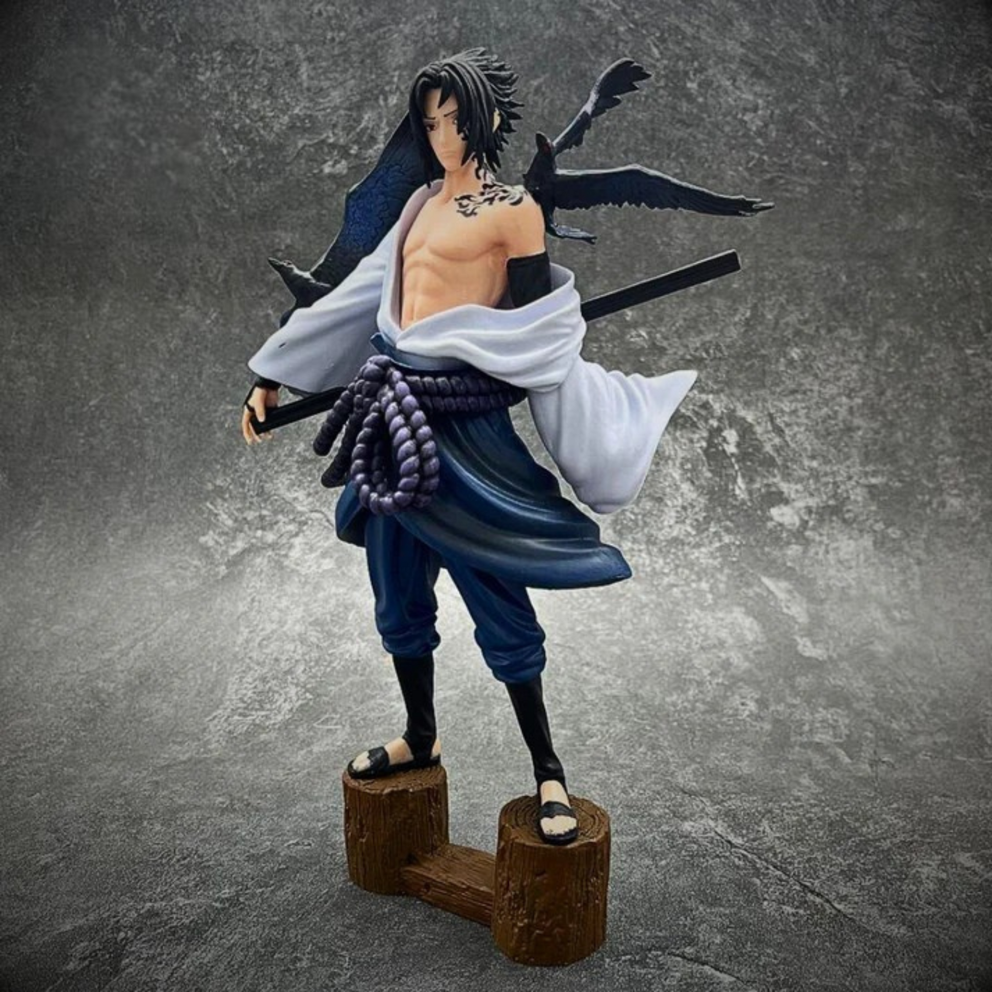 Sasuke Uchiha 30 cm action figure in Shippuden outfit with sword and intense gaze